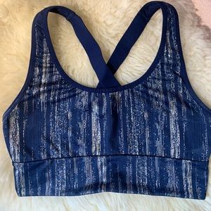 Victoria’s Secret sports bra with criss-cross back straps, size XS.